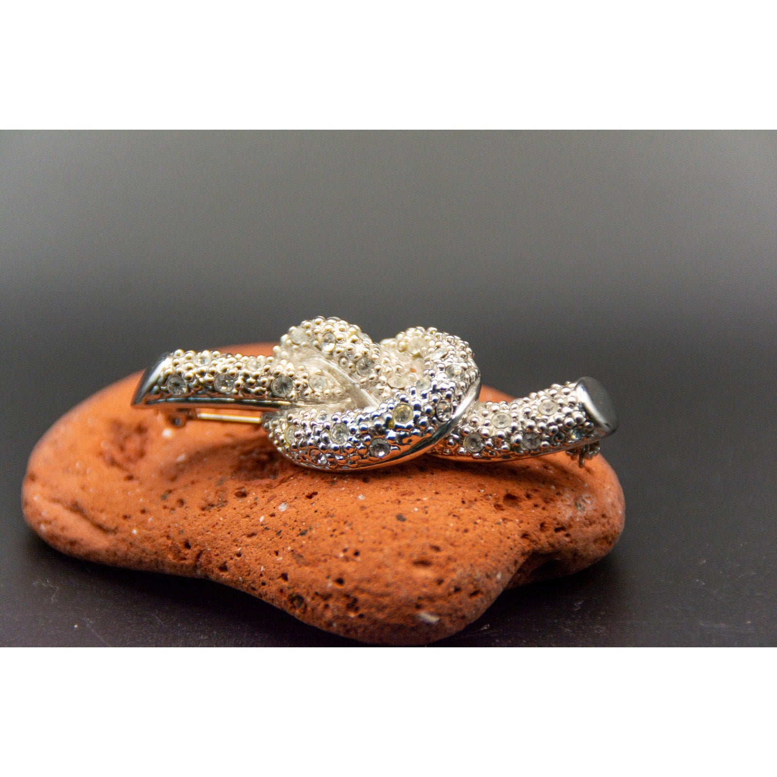 Vintage 80s Silver Tone Pave Rhinestone Oval Knot Brooch Pin